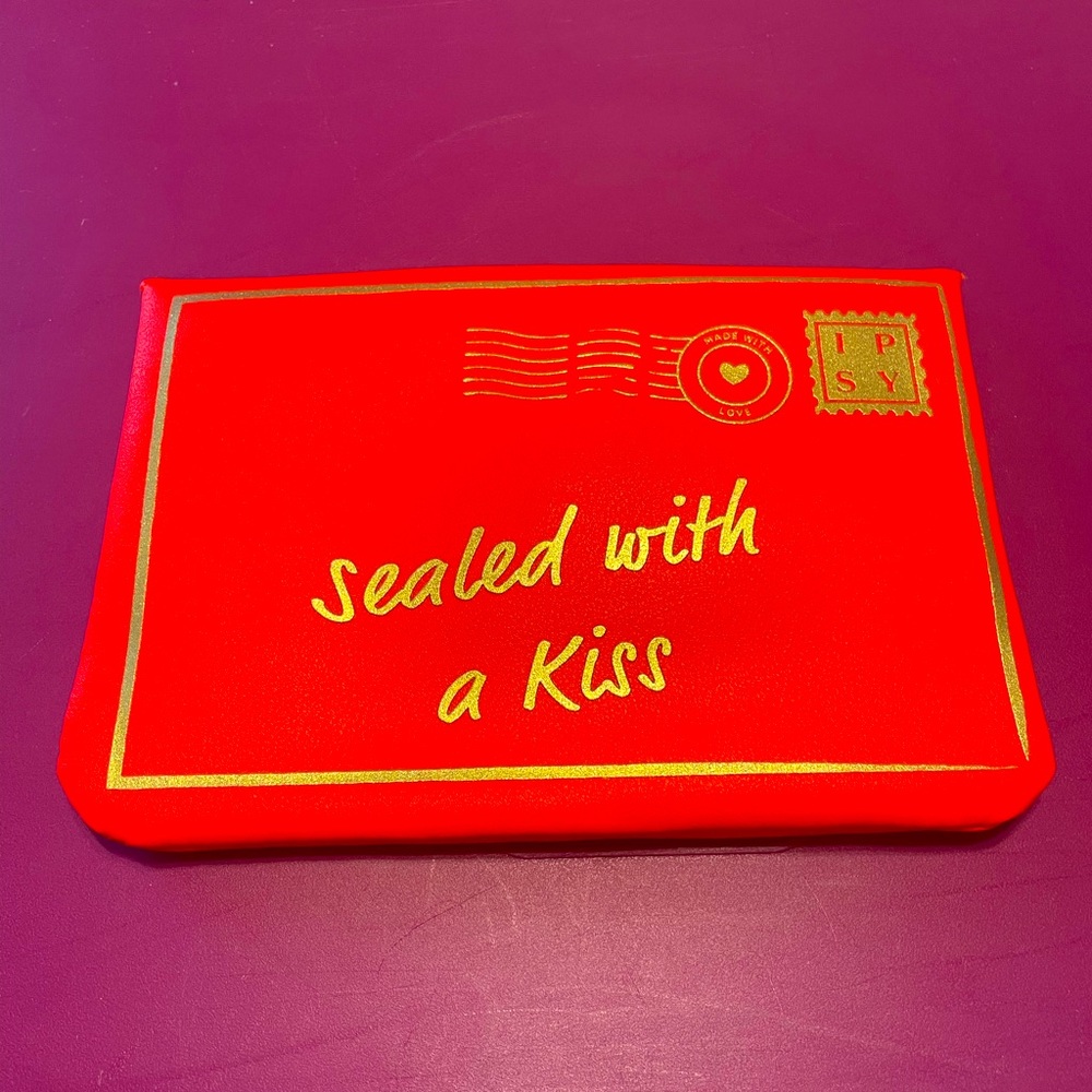 Brand new Ipsy glam bag- red “Sealed with a kiss” envelop me style pouch